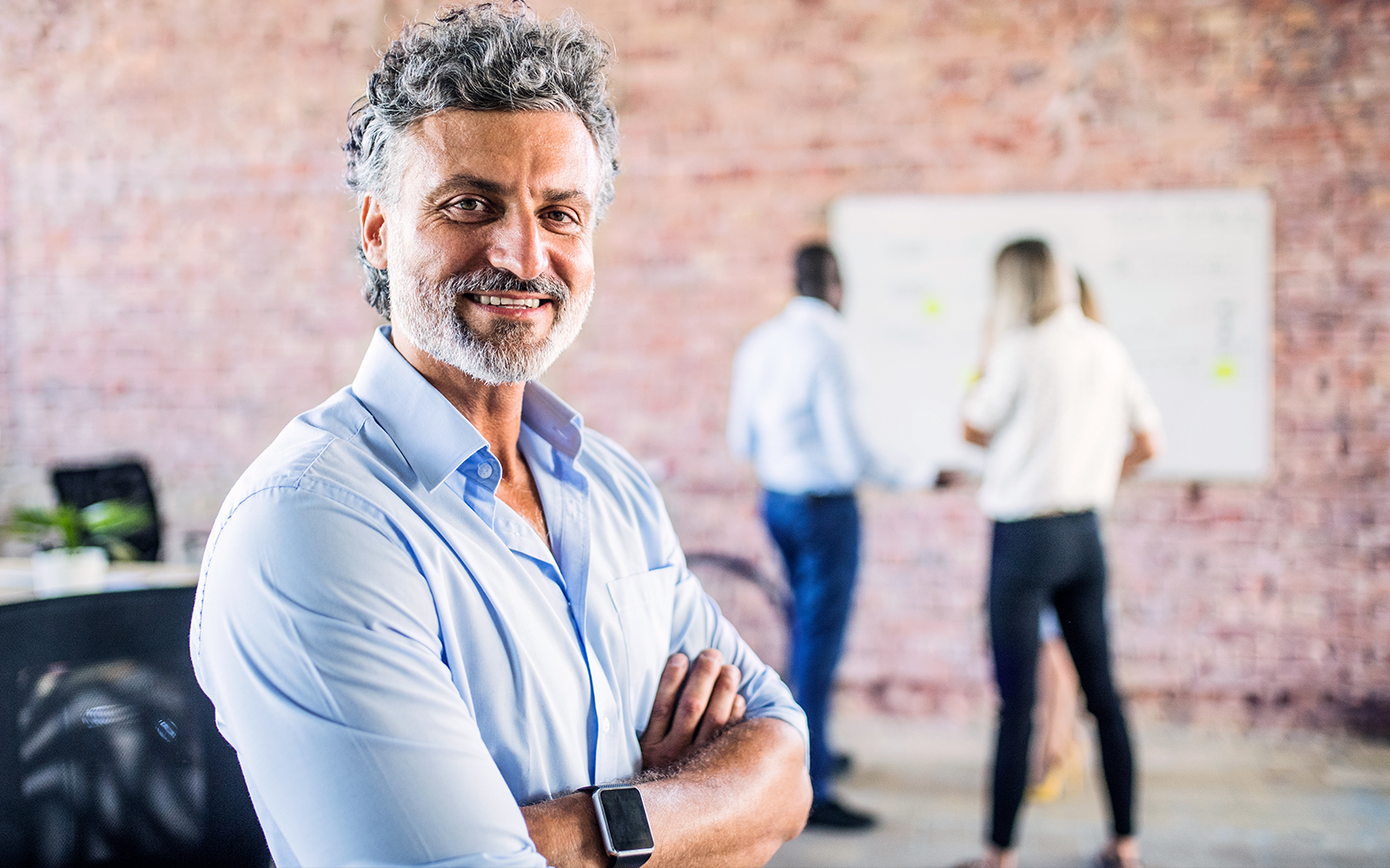 Man smiling business setting